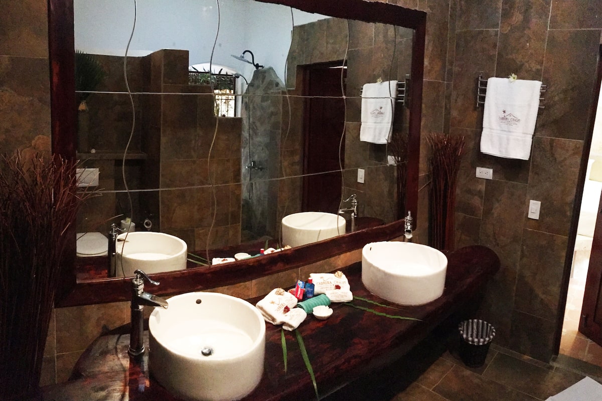 family suite, multiple beds, non smoking, garden view | bathroom | shower, free toiletries, towels, soap