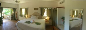 Suite luxueuse, 1 très grand lit, non-fumeur, vue sur le jardin | Literie de qualité, couette en duvet, décor unique, ameublement unique