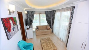 Deluxe Studio Suite, Sea View | Living area | LCD TV - Reyda Boutique Hotel (Arsuz)