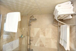 Basic Single Room, Partial Sea View | Bathroom amenities | Shower, free toiletries, hair dryer, slippers