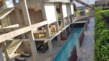 Outdoor pool, open 6:00 AM to 10:00 PM, sun loungers