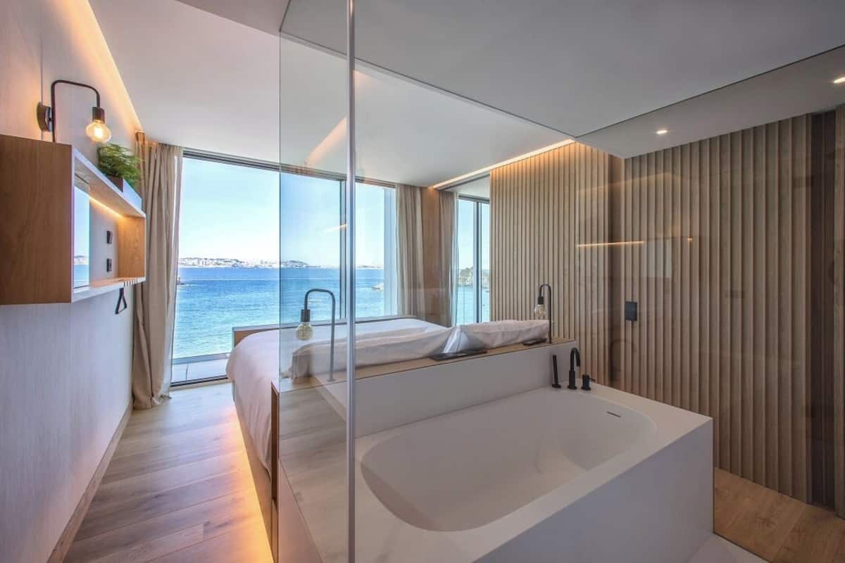 junior suite | bathroom | rainfall showerhead, free toiletries, hair dryer, towels