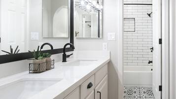 Bathtub, hair dryer, towels