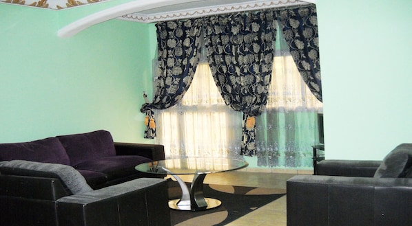 32-inch flat-screen TV with satellite channels, TV