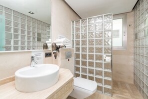 Bathtub, hair dryer, towels
