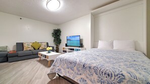 1 bedroom, desk, iron/ironing board, travel crib