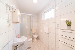 Shower, free toiletries, hair dryer, towels