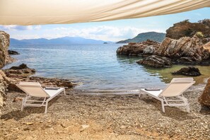 On the beach, sun-loungers, beach towels - Thalasses Villas Skiathos 6 People Beachfront Villa (Skiathos)