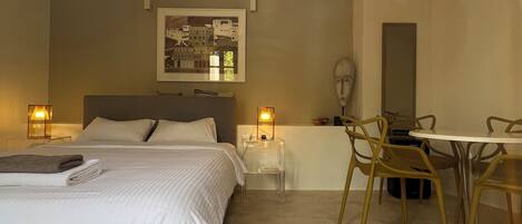 1 dormitorio, tabla de planchar con plancha, wifi gratis y ropa de cama