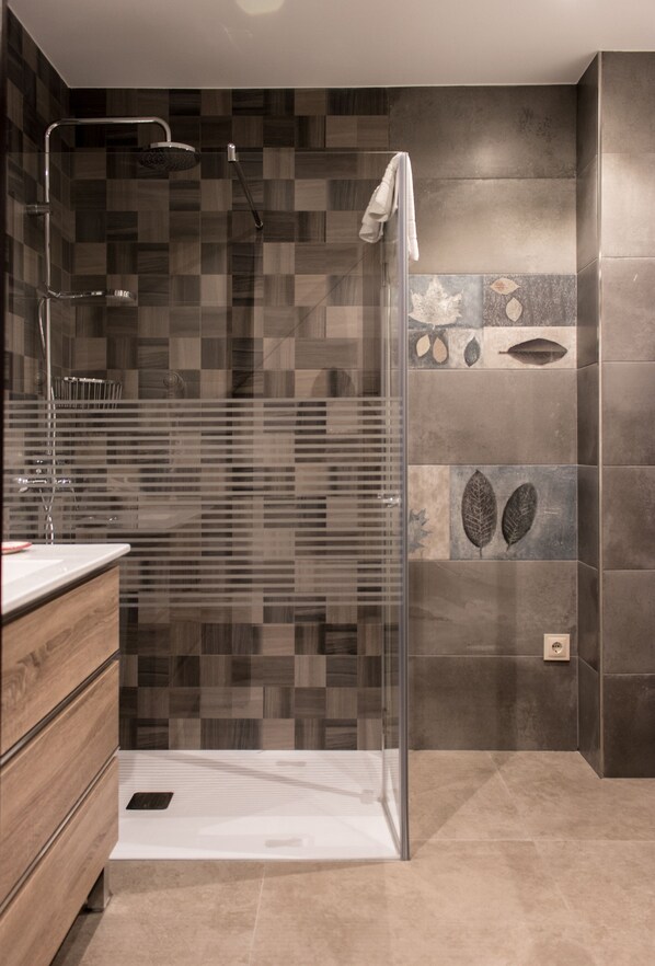 Hair dryer, towels, soap, shampoo