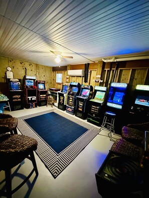 Game room - Waterfront with Ocean Views, Private Pier, Arcades, Game Room, Firepit, Hot Tub! (Oak Island)