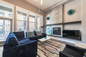 Smart TV, fireplace, books