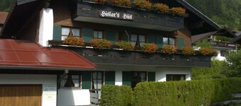 Sunny 2-room apartment with south/west-facing balcony.  Summer mountain railway ticket included