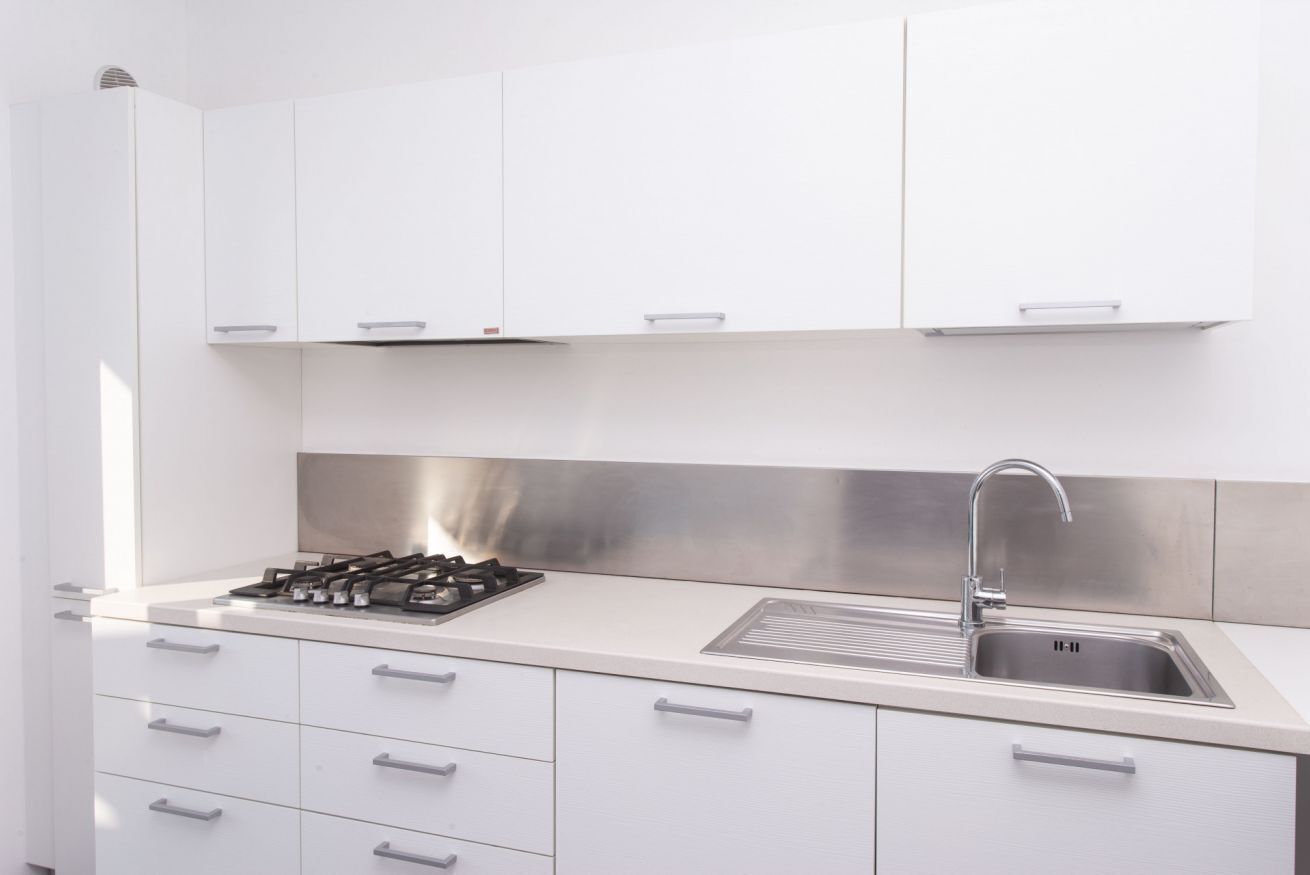 Fridge, oven, dishwasher, dining tables