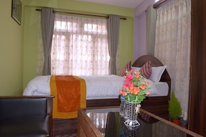 Habitación triple Deluxe, varias camas | Wifi gratis