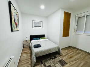 3 dormitorios, escritorio, tabla de planchar con plancha y wifi gratis