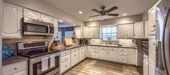 Newly remodeled stilted home with an apartment and game room! Great sunsets!