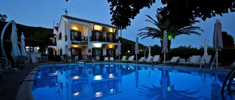 Seasonal outdoor pool, pool umbrellas, pool loungers