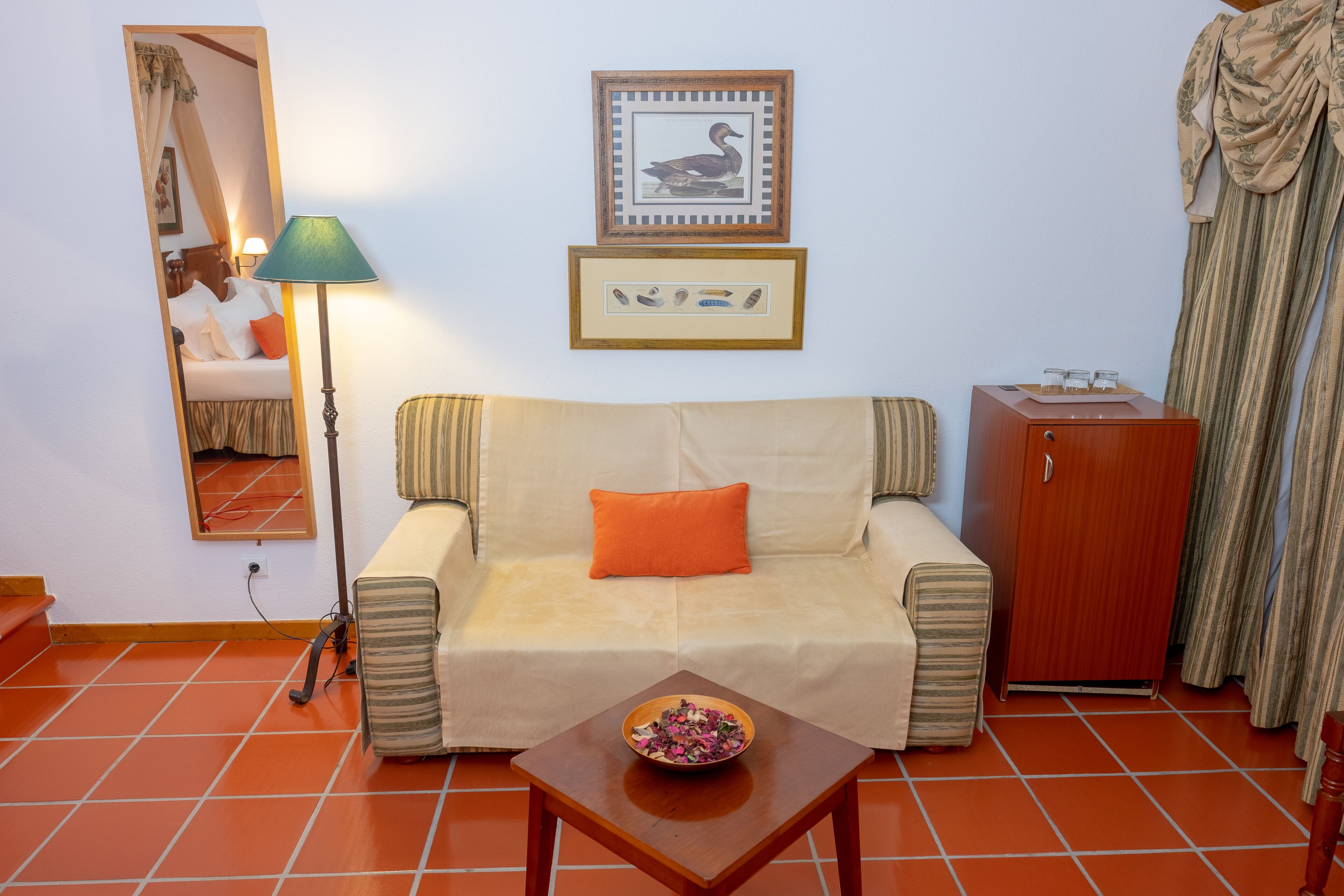 standard triple room | living area | lcd tv