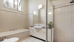 Bathtub, hair dryer, towels