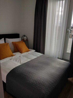 Deluxe appartement, 1 tweepersoonsbed | Individueel gedecoreerd, individueel gemeubileerd, een bureau
