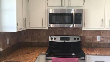 Classic House, Multiple Beds | Private kitchen | Full-size fridge, microwave, oven, stovetop