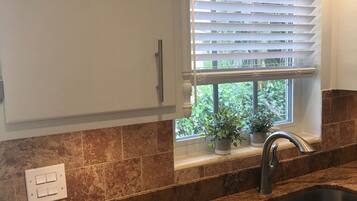 Classic House, Multiple Beds | Private kitchen | Full-size fridge, microwave, oven, stovetop