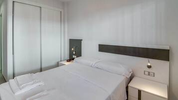 2 dormitorios, tabla de planchar con plancha, wifi gratis y ropa de cama