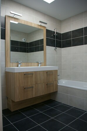 Bathtub, hair dryer, towels