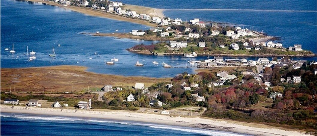 Aerial view of house showing location to pool and beach
