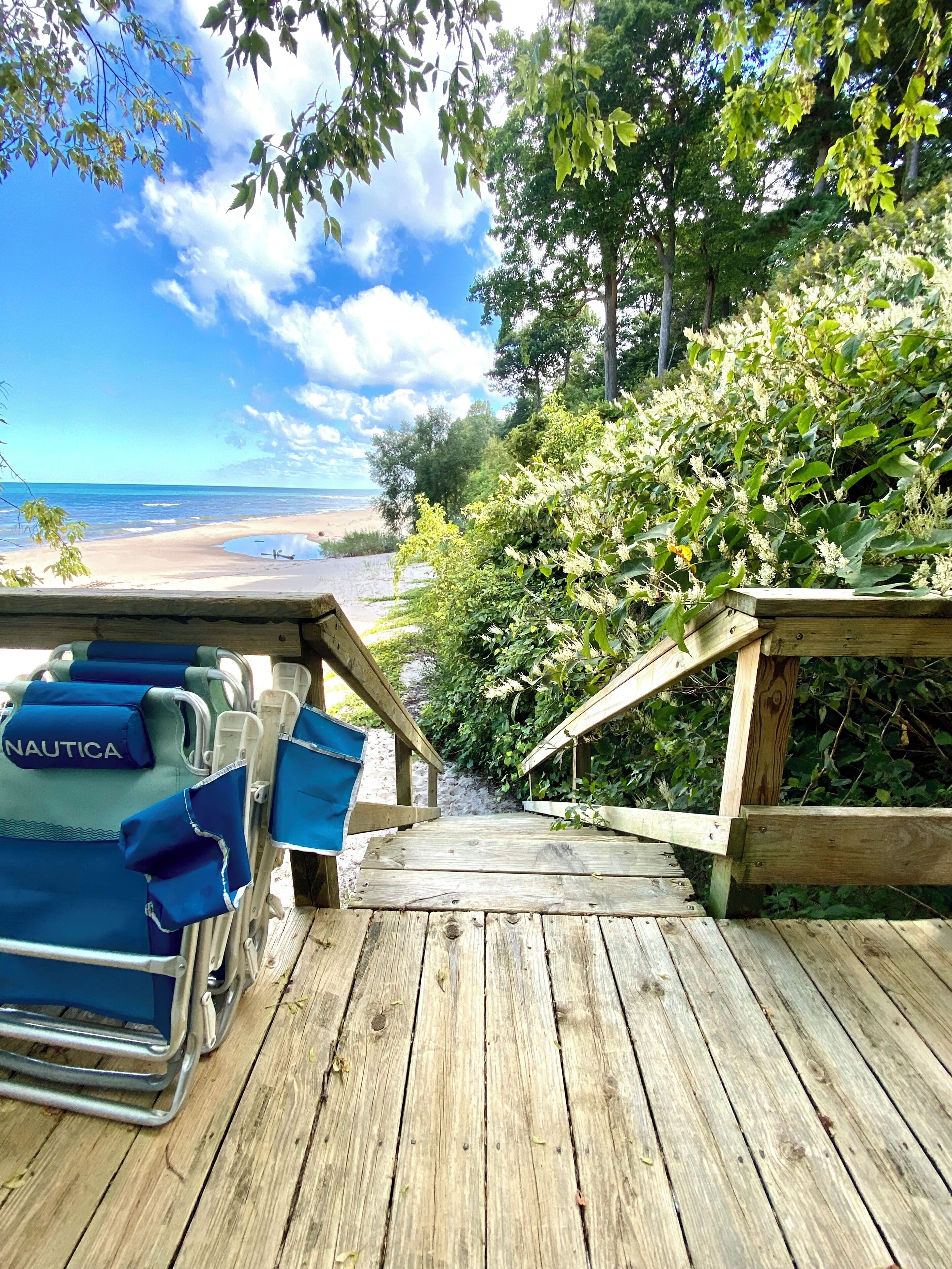 On the beach, sun-loungers, beach towels