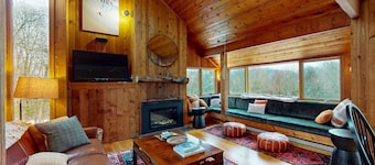 Ski home in the woods with a private hot tub & mountain views