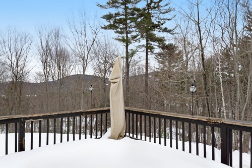 Open concept home close to the beach with gas fireplace and deck