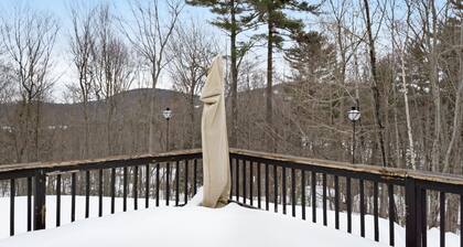 Open concept home close to the beach with gas fireplace and deck