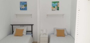 3 slaapkamers, een strijkplank/strijkijzer, wifi, beddengoed