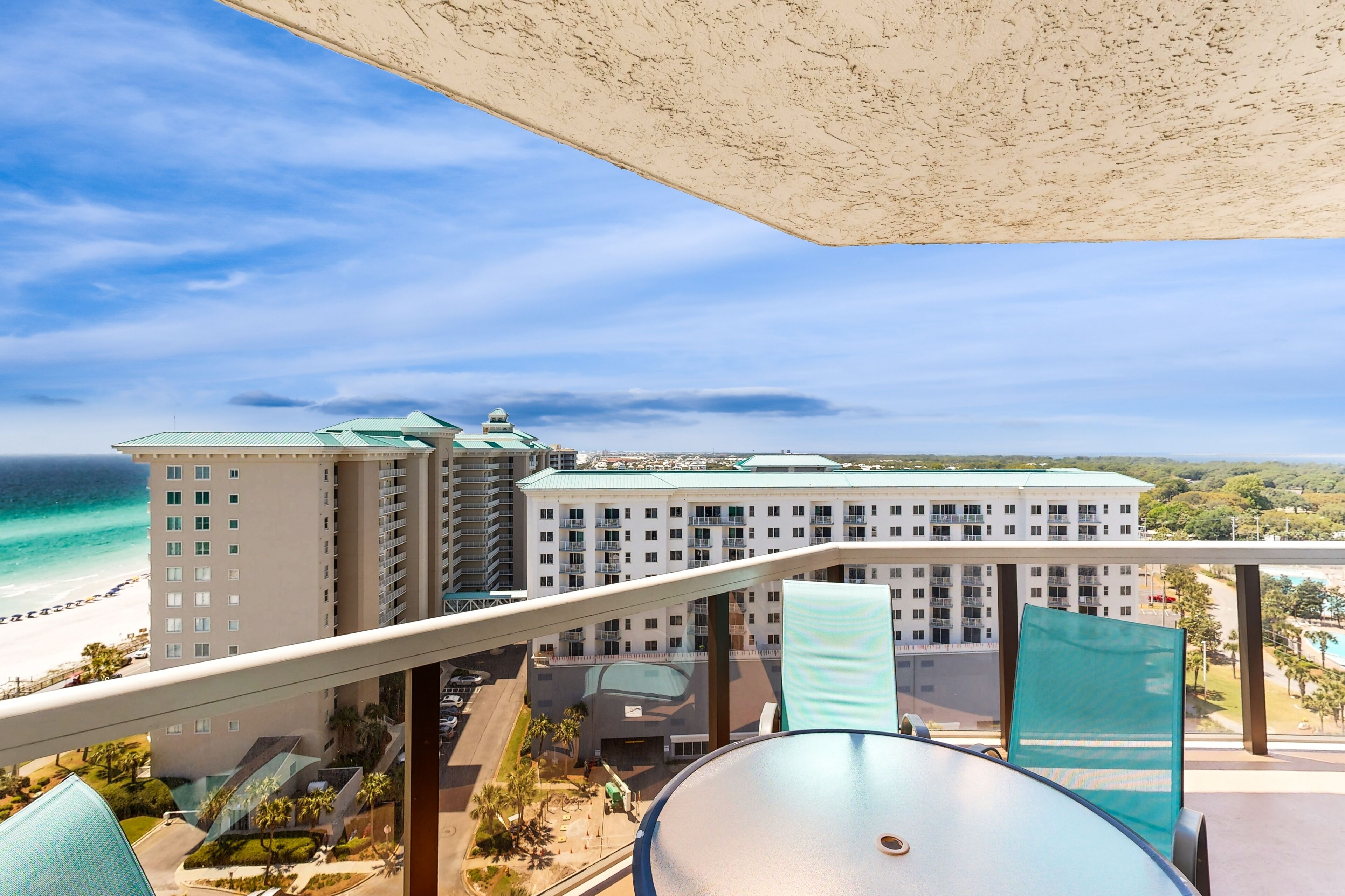 Cozy coastal condo with balcony, beach views, & resort pool