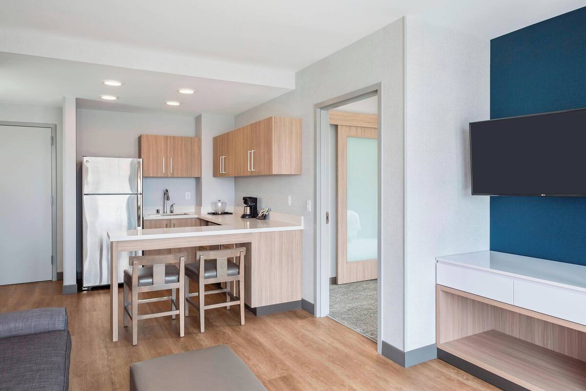 desk, laptop workspace, blackout curtains, iron/ironing board