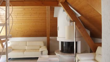 Deluxe Apartment (Maisonette) | Living area | 80-cm Smart TV with cable channels