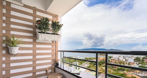 Premier Apartment, 2 Bedrooms, Sea View, Beachfront | Balcony - TroBee Host - Oceanus Nha Trang (Nha Trang)