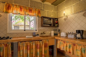 Fridge, microwave, toaster, cookware/dishes/utensils