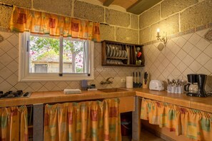 Fridge, microwave, toaster, cookware/dishes/utensils