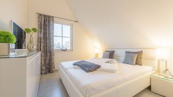 4 bedrooms, in-room safe, iron/ironing board, travel cot