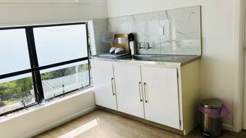 Family House, 2 Bedrooms | Private kitchen | Full-sized fridge, microwave, oven, stovetop