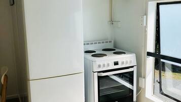 Family House, 2 Bedrooms | Private kitchen | Full-sized fridge, microwave, oven, stovetop