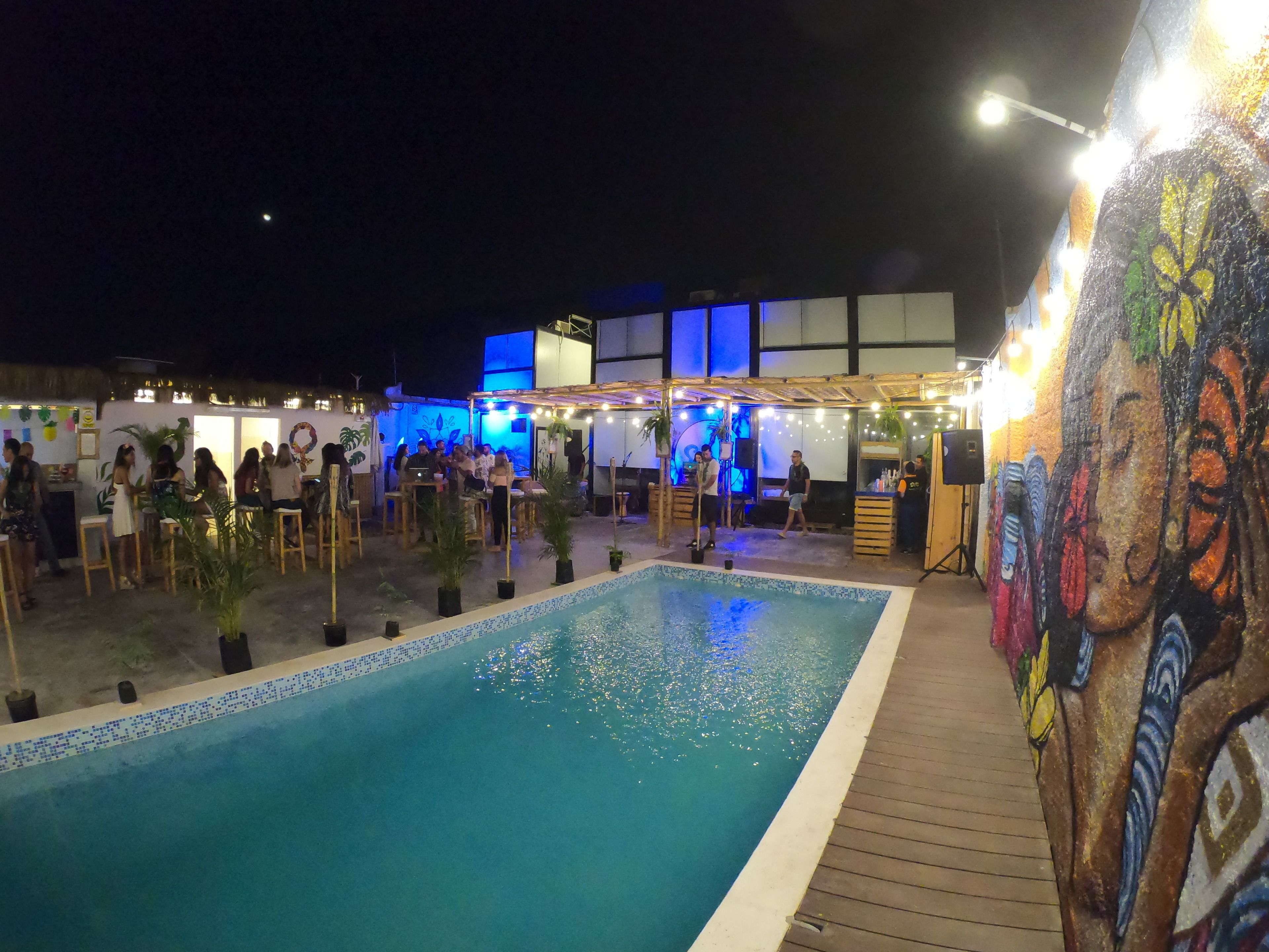 Outdoor pool, open 9:00 AM to 9:00 PM, pool umbrellas, pool loungers