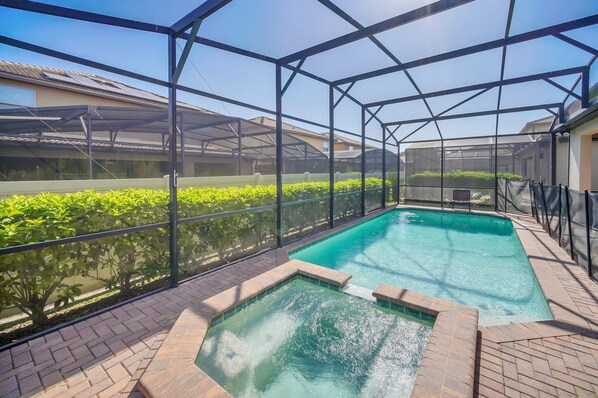 A heated pool, pool loungers