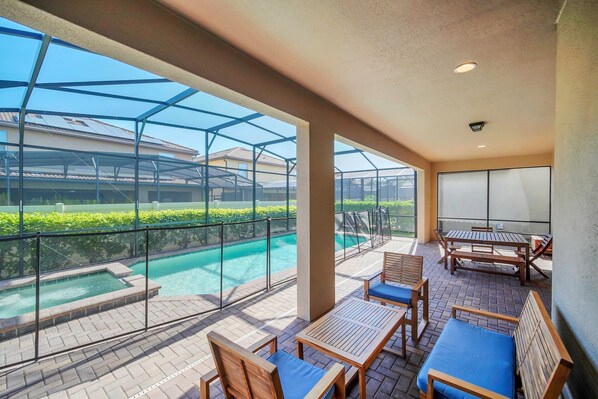 A heated pool, pool loungers