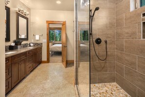 Combined shower/bathtub, hair dryer, towels, soap