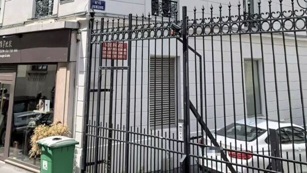 A multi-story building with white exterior walls, black wrought iron balconies, and a gated entrance. - PORTE MAILLOT & ETOILE - PERFECT WORK & TOURIST LOCATION - LUX RENOVATED FLAT (Paris-16)