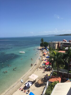On the beach, sun loungers, beach towels - Romantic Studio Apartment with Amazing View (Cabo Rojo)